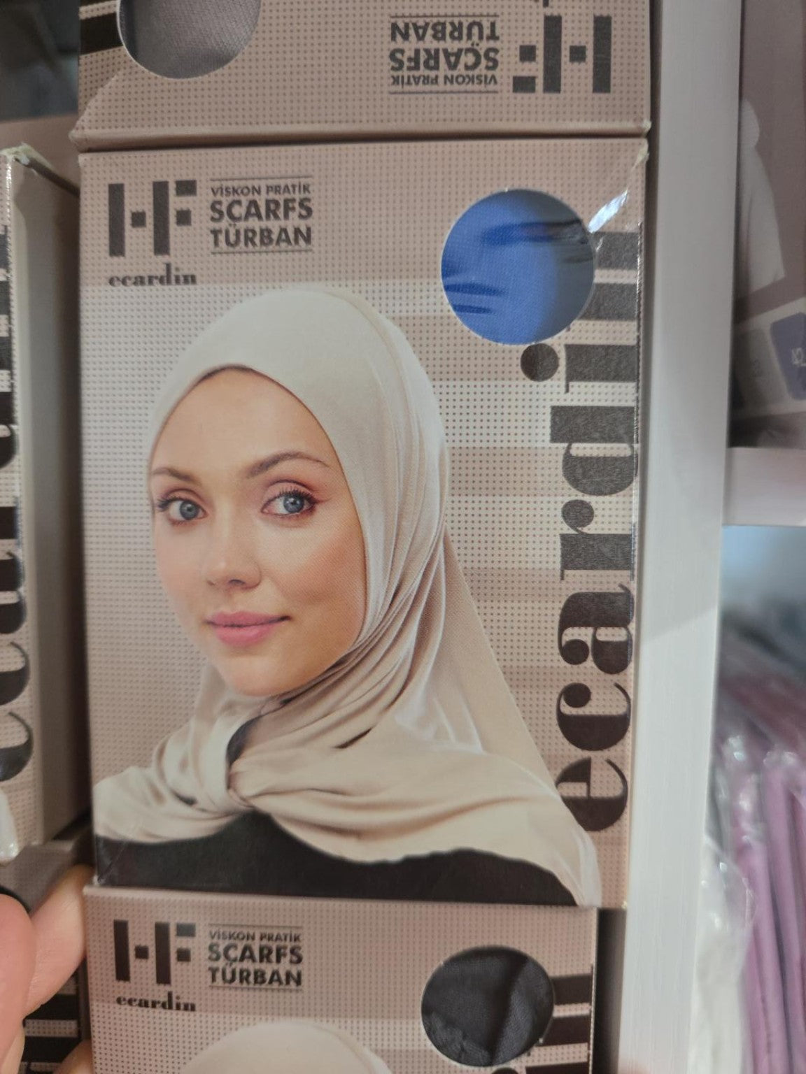 Original Ecardin ST101 viscose instant hijab packaging showing beige hijab on model